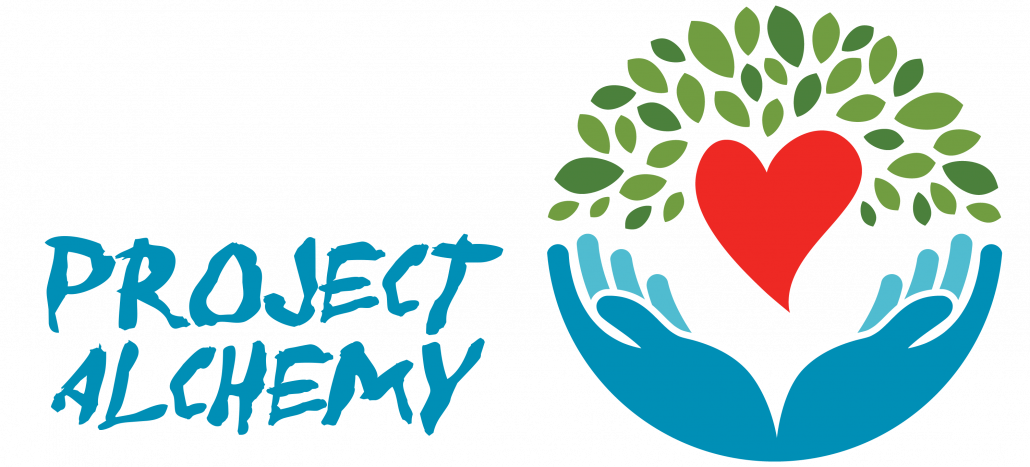 hands outstretched with a love heart above under some leaves - text 'project alchemy'